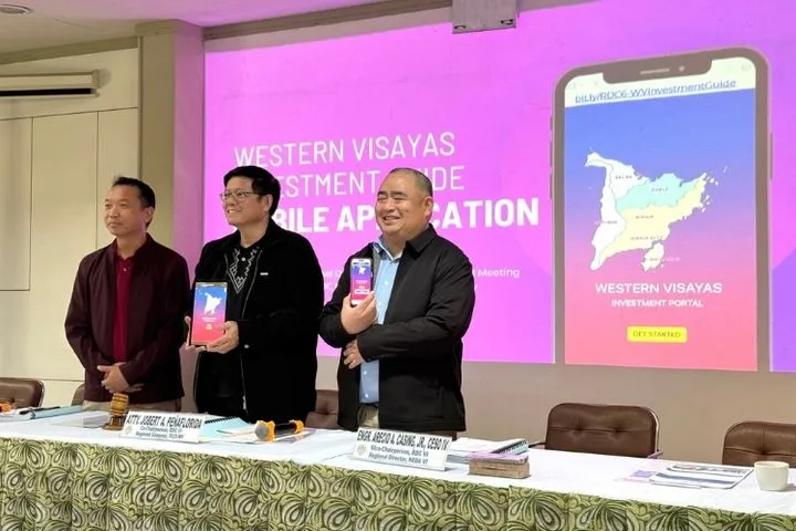 The Western Visayas Investment Guide mobile app shown on phones at its launch